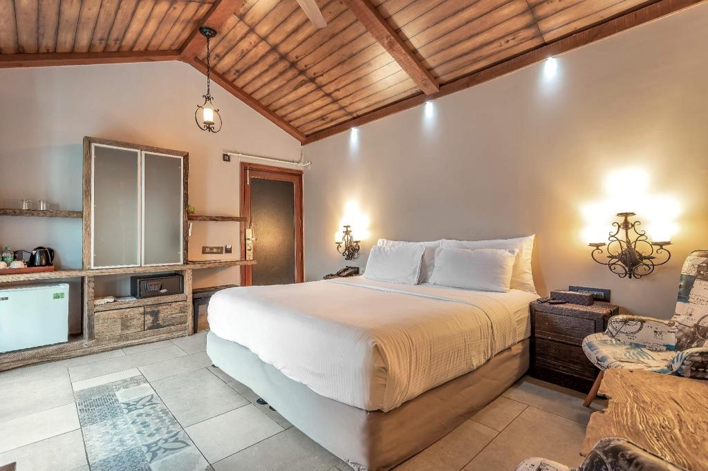 The Baga Beach Resort  Rooms  Pool Side Cottage Bedroom 18   Copy